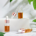 100 Pcs Mini Glass Oil Dropper Bottle Bulk, Clear Essential Small Empty Bottles Sample Containers Perfume Liquid Vials with Cap for Traveling (10 ml,Rose Gold)