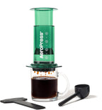 AeroPress Clear Green Coffee Press - All-in-One French Press, Pour-Over & Espresso Style Manual Brewer, 2 Min Brew for Less Bitterness, More Flavor, Small Portable Coffee Maker, Travel & Camping