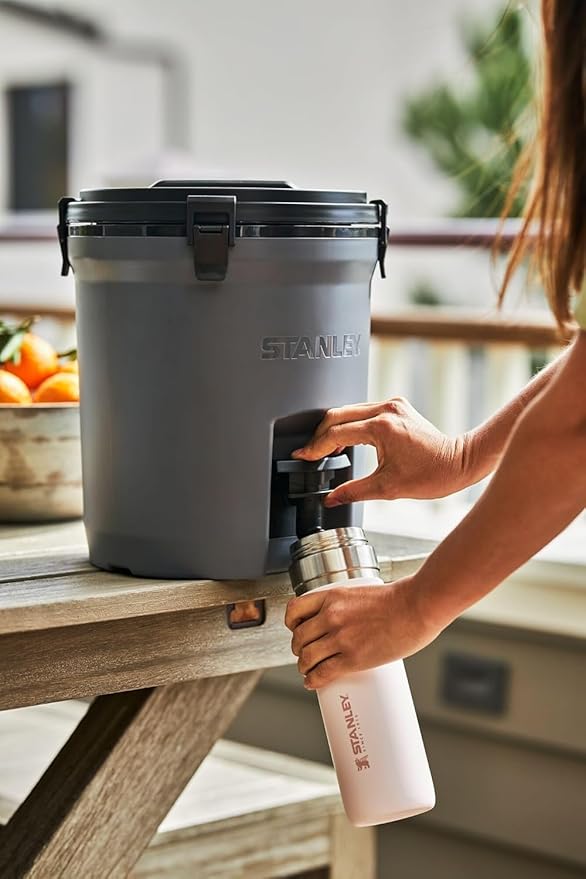 Stanley Quick Flip GO Water Bottle 24 oz | Push Button Lid | Leakproof and Packable for Travel and Sports | Insulated Stainless Steel | BPA-Free | Rose Quartz