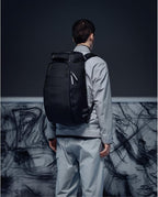 Db Journey The Hugger - Durable Travel Backpack with Laptop Compartment for Work & Gym, Luggage Backpack with Roller Bag Attachment, Full-Zip Main Compartment, 30L - Charcoal Grey