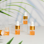 100 Pcs Mini Glass Oil Dropper Bottle Bulk, Clear Essential Small Empty Bottles Sample Containers Perfume Liquid Vials with Cap for Traveling (2 ml,Gold)