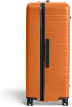 Away Large Trunk Luggage, 31 Inch Hardside Suitcase with Spinner Wheels, Lightweight & Durable, TSA Lock, Ideal for Long Trips, Sorbet Orange