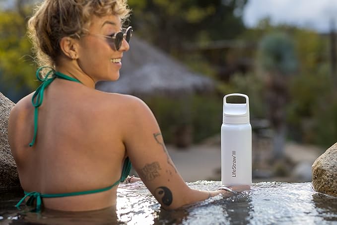 LifeStraw Go Series — Insulated Stainless Steel Water Filter Bottle for Travel and Everyday Use Removes Bacteria, Parasites and Microplastics, Improves Taste, 24oz Polar White