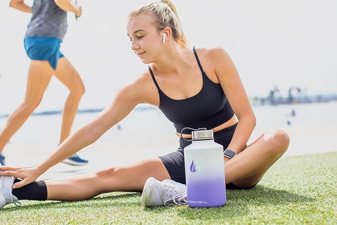 HYDRO CELL Stainless Steel Insulated Water Bottle with Straw - For Cold & Hot Drinks - Metal Vacuum Flask with Screw Cap and Modern Leakproof Sport Thermos for Adults (Lavender/White 64oz)