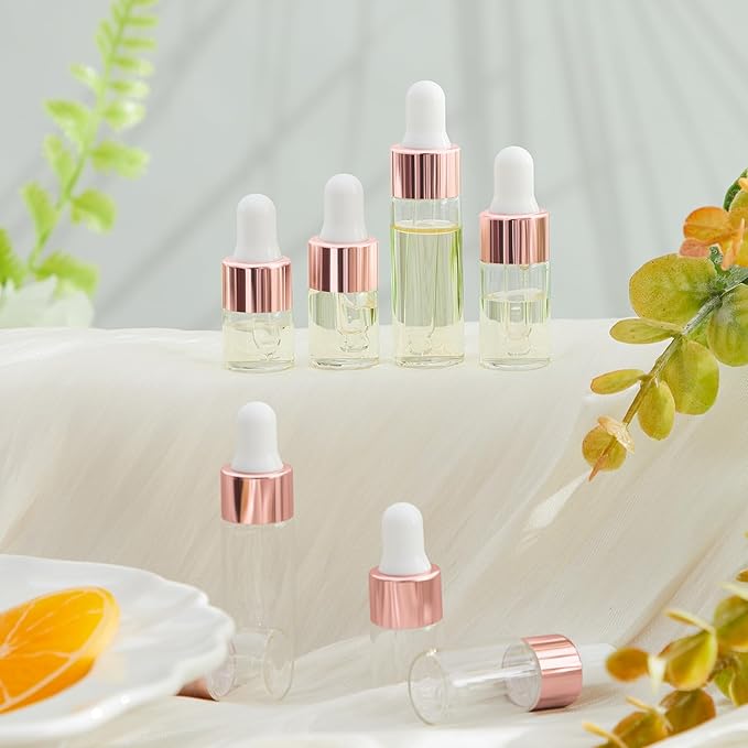 100 Pcs Mini Glass Oil Dropper Bottle Bulk, Clear Essential Small Empty Bottles Sample Containers Perfume Liquid Vials with Cap for Traveling (1ml,2ml,3ml,5ml,Rose Gold)