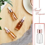 100 Pcs Mini Glass Oil Dropper Bottle Bulk, Clear Essential Small Empty Bottles Sample Containers Perfume Liquid Vials with Cap for Traveling (10 ml,Rose Gold)