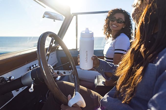 LifeStraw Go Series — Insulated Stainless Steel Water Filter Bottle for Travel and Everyday Use Removes Bacteria, Parasites and Microplastics, Improves Taste, 24oz Polar White