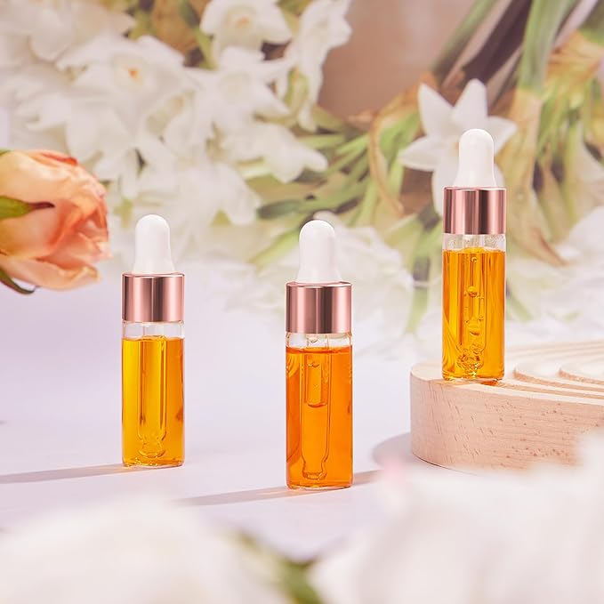 200 Pcs Mini Glass Oil Dropper Bottle Bulk, Clear Essential Small Empty Bottles Sample Containers Perfume Liquid Vials with Cap for Traveling (5 ml,Rose Gold)