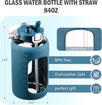 BLUEGO 84oz Water Bottle Glass with Stainless Steel Handle Large 2.5l Water Bottle with Time Markers and Silicone Sleeve Half Gallon Water Jug BPA Free for Gym Daily Use, Dark Blue