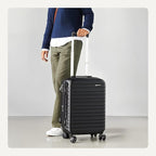 Amazon Basics 21" Hardside Carry-On Luggage with Spinner Wheels, Expandable for Up to 25% More Space, Scratch-Resistant Hard Shell, Telescoping Handle, Black