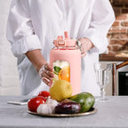 BLUEGO 84oz Water Bottle Glass with Stainless Steel Handle Large 2.5l Water Bottle with Time Markers and Silicone Sleeve Half Gallon Water Jug BPA Free for Gym Daily Use, Pink