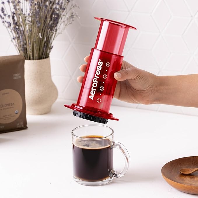 AeroPress Clear Red Coffee Press - All-in-One French Press, Pour-Over & Espresso Style Manual Brewer, 2 Min Brew for Less Bitterness, More Flavor, Small Portable Coffee Maker, Travel & Camping