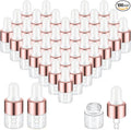 100 Pcs Mini Glass Oil Dropper Bottle Bulk, Clear Essential Small Empty Bottles Sample Containers Perfume Liquid Vials with Cap for Traveling (1 ml,Rose Gold)