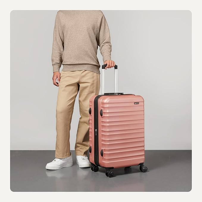 Amazon Basics 26" Hardside Medium Checked Luggage, Expandable Hardshell Suitcase with Telescoping Handle, Scratch-Resistant Surface, Four Multi-directional Wheels, Rose Gold