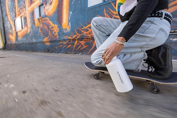 LifeStraw Go Series — Insulated Stainless Steel Water Filter Bottle for Travel and Everyday Use Removes Bacteria, Parasites and Microplastics, Improves Taste, 1L Aegan Sea