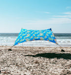 Neso Gigante - Portable Beach Tent - Ideal to Enjoy with Family and Friends - UPF 50+, Water-Resistant, and Lightweight - Tropical Floral, 11' x 11'
