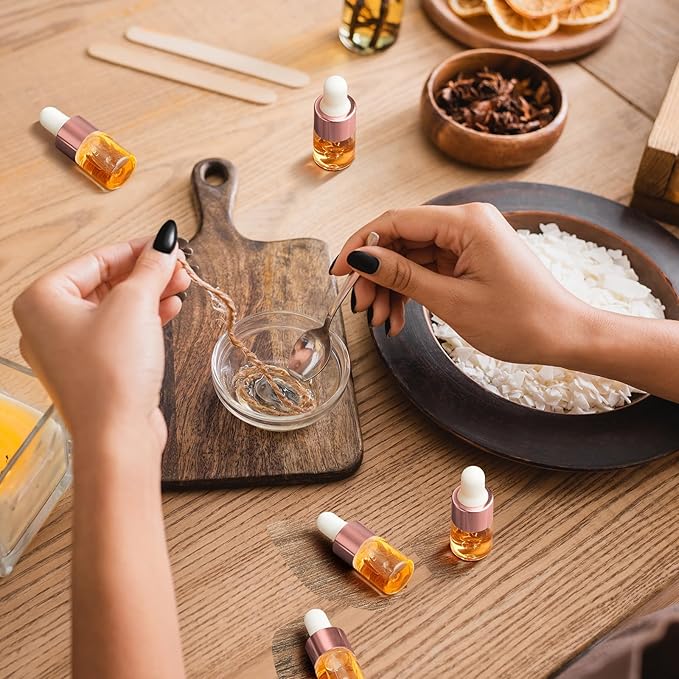 100 Pcs Mini Glass Oil Dropper Bottle Bulk, Clear Essential Small Empty Bottles Sample Containers Perfume Liquid Vials with Cap for Traveling (2 ml,Rose Gold)