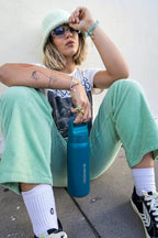 LifeStraw Go Series — Insulated Stainless Steel Water Filter Bottle for Travel and Everyday Use Removes Bacteria, Parasites and Microplastics, Improves Taste, 24oz Laguna Teal