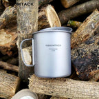 TIBROMTACK Camping Cup with Lid Pure Titanium Coffee Mug Ultralight 450ml Outdoor Small Camping Pot with Foldable Handle for Backpacking Hiking Travel and Daily Use with Mesh Bag