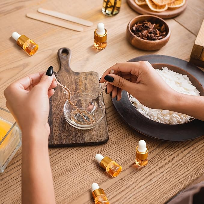 100 Pcs Mini Glass Oil Dropper Bottle Bulk, Clear Essential Small Empty Bottles Sample Containers Perfume Liquid Vials with Cap for Traveling (1 ml,Gold)