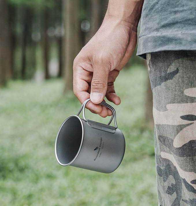 iBasingo 600ml Titanium Mug with Lid Tea Coffee Water Cup Outdoor Camping Pot Ultra-light Portable Hiking Backpacking Cooking Kit Picnic Tableware Drinkware with Foldable Handle Ti3036D